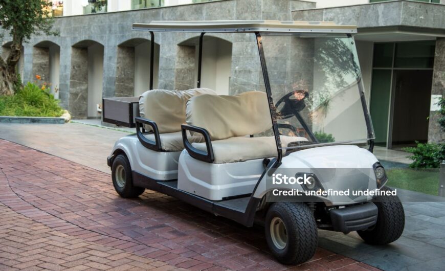 Electric golf car in the summer resort